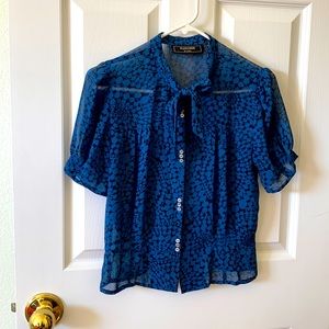 Cute top with bowtie detail at top